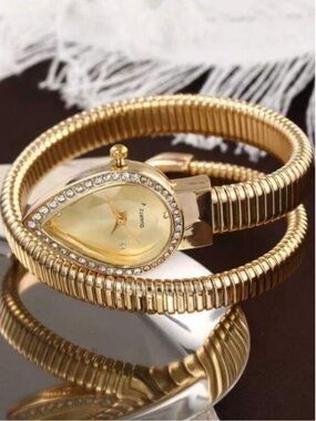 Luxe Sculptural Gold Coil Watch